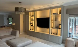 The internal timber framing and cable conduit system of a bespoke media wall under construction to ensure a clean and professional finish